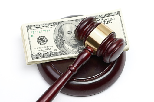 Law gavel on a stack of American money Schill Law Group Arizona Attorneys